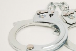 Probationer arrested for domestic violence, felony warrants