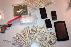 Routine Traffic Stop Produces Guns, Money, & Drugs