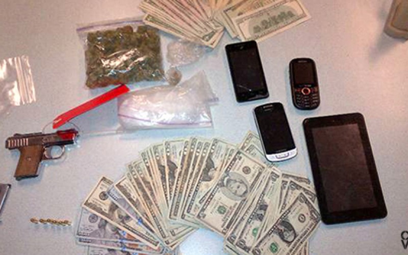 Routine Traffic Stop Produces Guns, Money, & Drugs