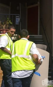 Workers clean the scene in the aftermath of the shooting.