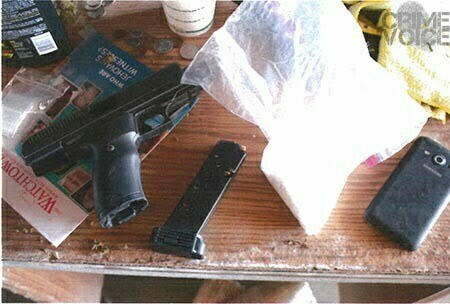 A semi-automatic pistol and crystal meth found at Chan's residence.