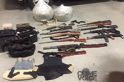 One in Custody for Mass Cache of Drugs and Weapons