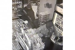 Police Search for Two Armed Gunmen