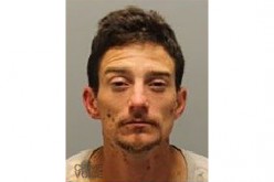 Man Brandishing Stolen Gun Arrested