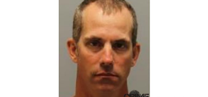 Man arrested for taking photos of young girl