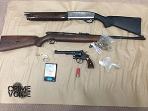 Police display weapons they confiscated