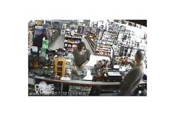 Man Attempts to Snatch Cash off of Store Counter