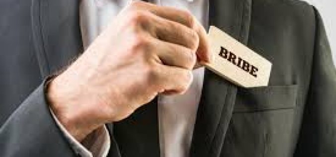 Ex-State Inspector Charged with Bribery