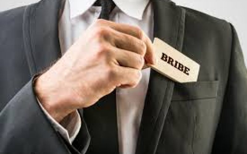 Ex-State Inspector Charged with Bribery