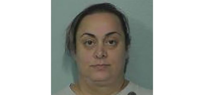 Woman Charged in Immigration Scam