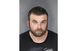 Elk River resident reports suspicious vehicle parked in his driveway; driver arrested on possession charges