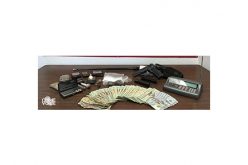 Drugs and a Loaded Stolen Gun, and a Child