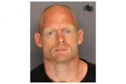 Man with Many Warrants Runs Stop Sign