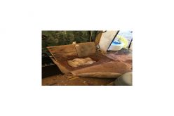 Hole on carport floor conceals drugs and cash