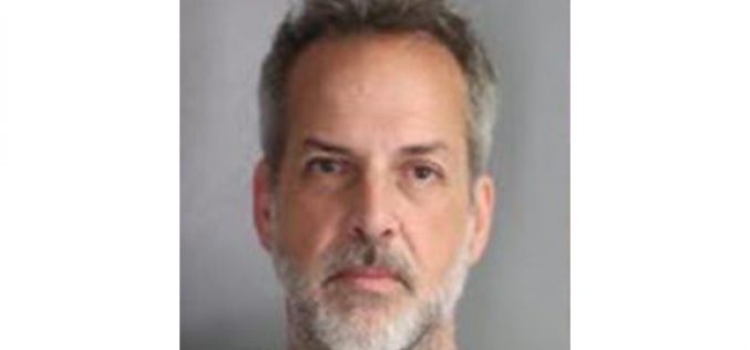 Photographer arrested on sexual assault charges