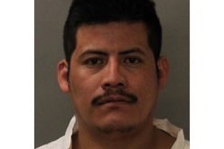 Man arrested after firing gun inside apartment to scare wife and child