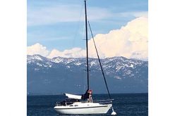Two Girls take a dinghy for joyride on Lake Tahoe