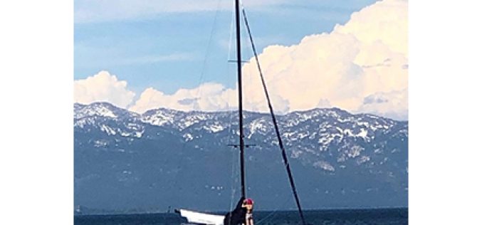 Two Girls take a dinghy for joyride on Lake Tahoe