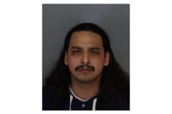 Gang member tries to run, drops his gun