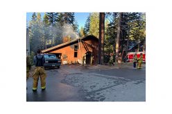 Man arrested in connection to two structure fires