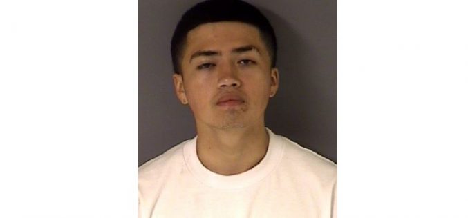 Man caught hiding inside vehicle