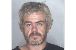 Urinating transient takes it out on arresting officers