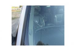 Man throws rocks at passing cars, causing damage