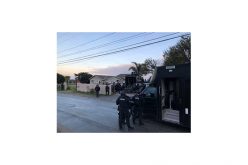 Man arrested for shooting rifle from moving vehicle