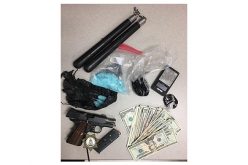Stolen travel trailer with guns, heroin, meth and a perp-NEEDS LINK