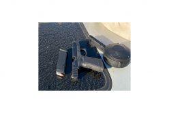 Car with fake registration has Glock and loaded drum inside