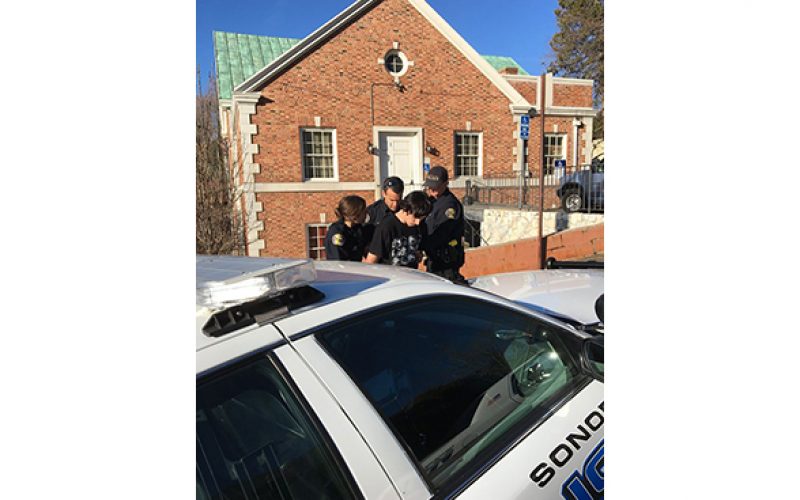 DUI driver hits railing, building, runs away