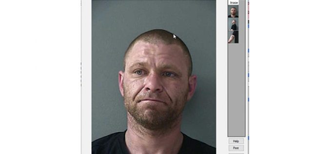 Burglary interrupted, one in custody, one outstanding