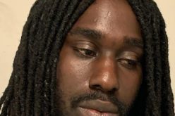 Pair arrested with two 50-round drum magazines, guns