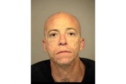 Parolee Caught with Drugs and Gun, living in Mobile Trailer