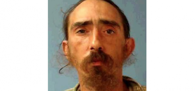 Man arrested on suspicion of setting fire in liquor store parking lot