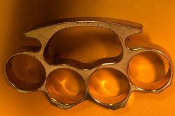 Man has brass knuckles, and on active felony probation