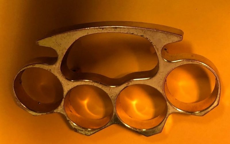 Man has brass knuckles, and on active felony probation