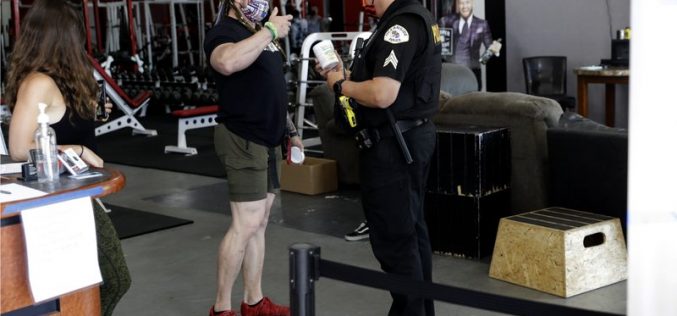 Owner reopens gym, charged with misdemeanor