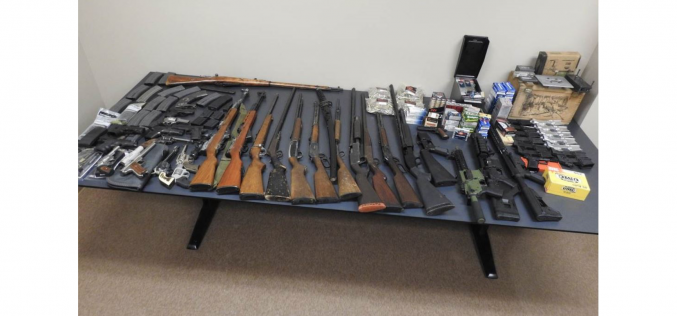 Guns, narcotics seized during service of marijuana cultivation search warrants