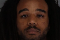 Police find a gun in his backpack