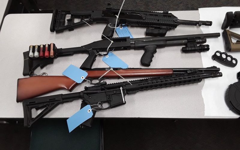 Neighborly dispute leads to discovery of guns