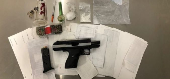 Counterfeit Checks, A Loaded Gun, and Drugs – Two Nabbed at Motel 6
