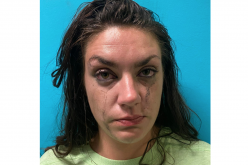 Woman arrested in connection to drugs, stolen gun found in room