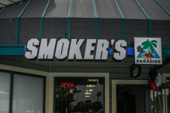 Two Robbers Caught, Third Remains at Large