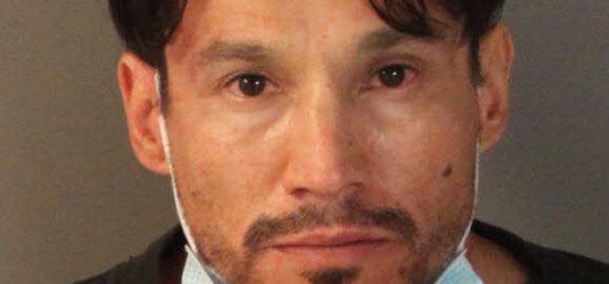 Man with two outstanding warrants also has lots of drugs