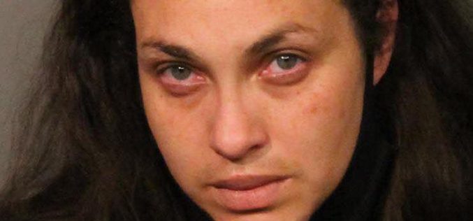 Female passenger carries loaded revolver and drugs