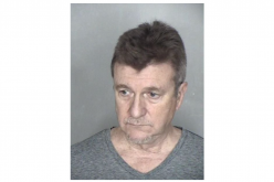 History professor arrested, accused of downloading child pornography