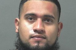 Gun-carrying motorcyclist speeds through stop sign and tries to escape