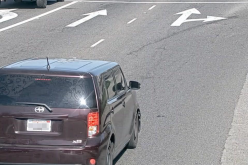 Couple try to flee in a purple boxy Scion