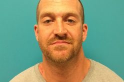 Man assaults two people with bottle